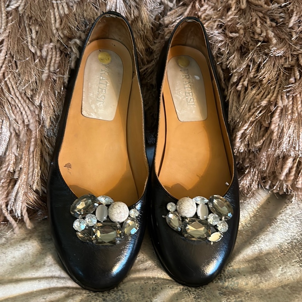Pratesi black leather flats. Crystal ornamentations on front of shoe.